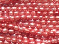 FWP 16inch Strand of 6x4mm Dark Pink Oval Pearls